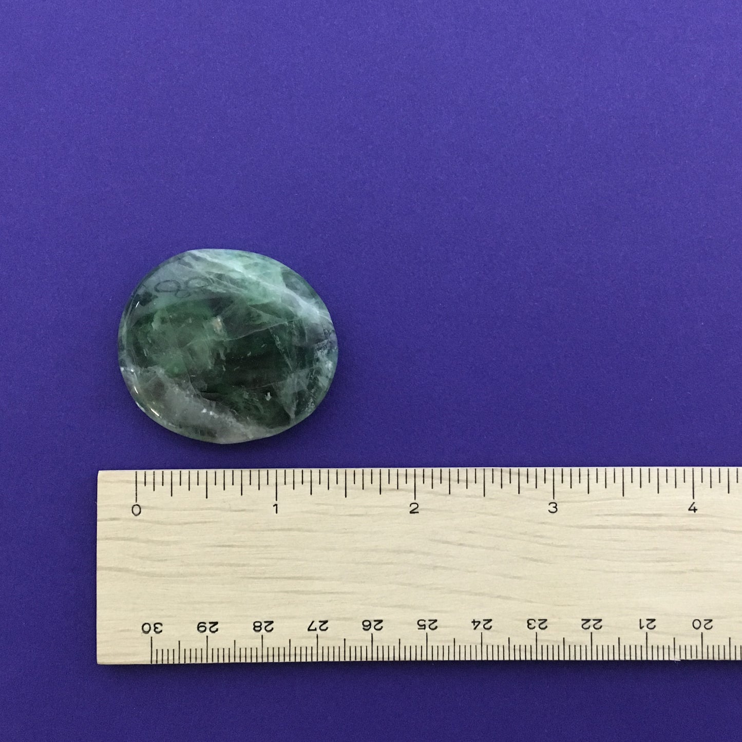 Fluorite - Rainbow Palm Stone $10